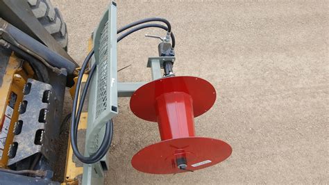 barbed wire winder skid steer|wire winders for tractors.